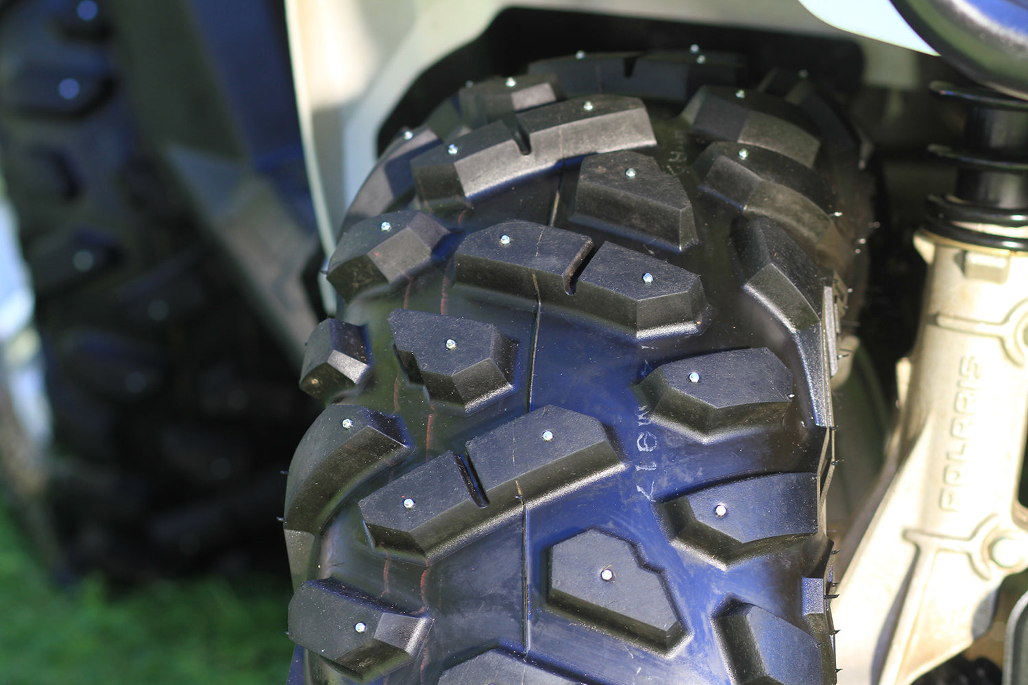 SS-32R iGrip 32mm shouldered racing tire studs providing professional traction and control on icy racing tracks